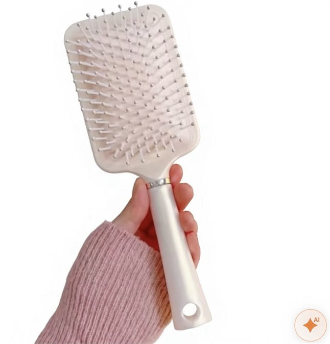 Cream pastel paddle hairbrush