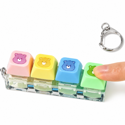 Care Bears fidget keychain green button being pressed