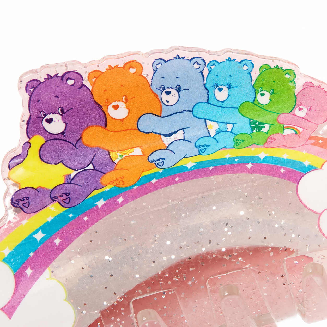 Close-up detail of Care Bears rainbow acrylic hair claw clip