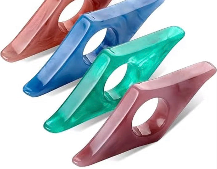 Assorted translucent thumb book page holders