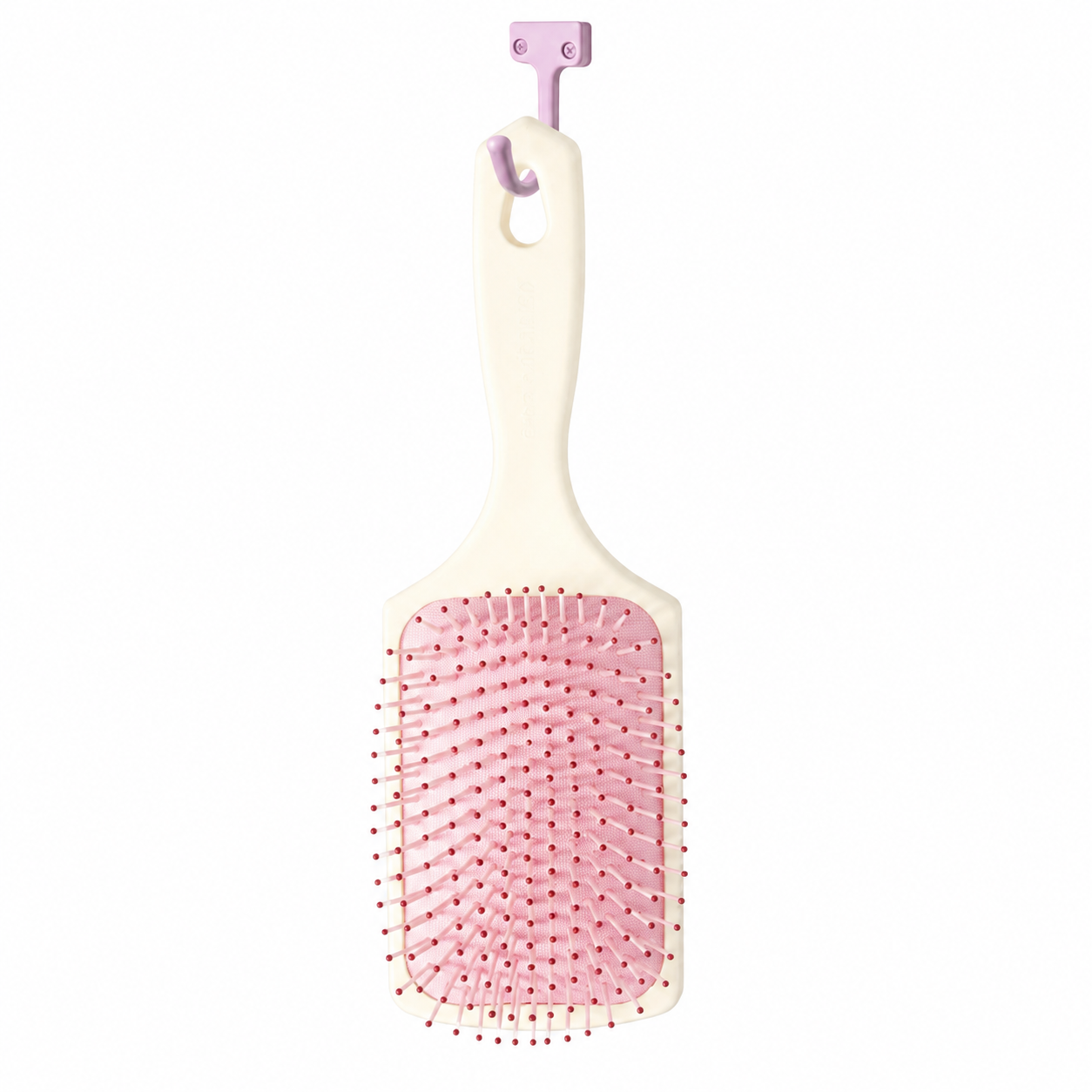 Strawberry Shortcake detangling brush hanging-handle view on white