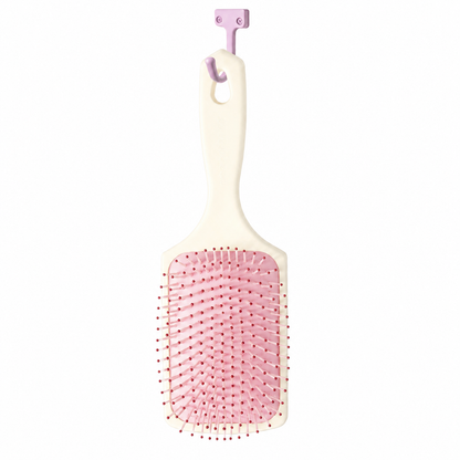 Strawberry Shortcake detangling brush hanging-handle view on white
