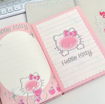 Hello Kitty pink notebook cover and interior pages