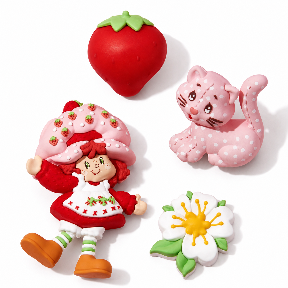 Strawberry Shortcake four-piece refrigerator magnet set close-up on white background