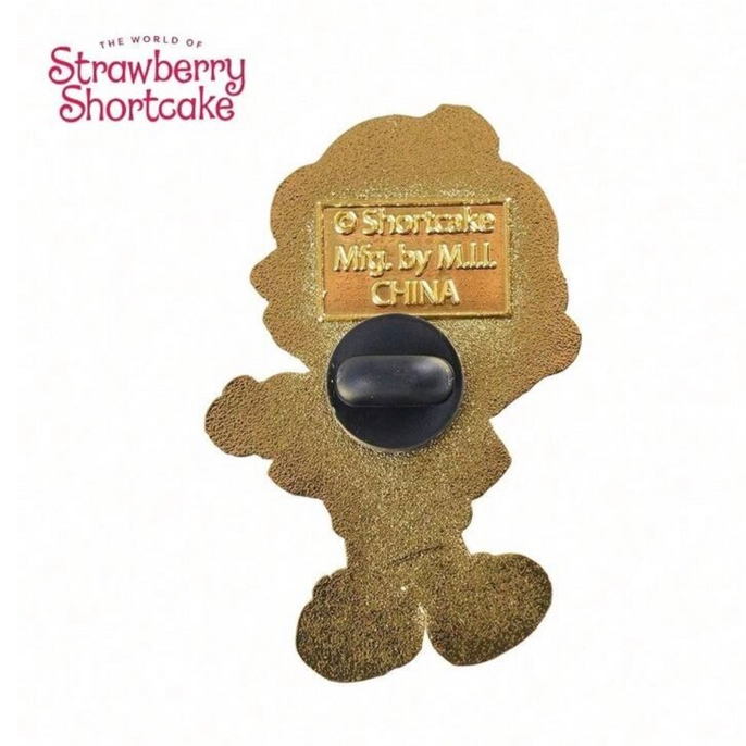 Back of Strawberry Shortcake enamel pin with rubber clutch